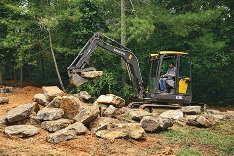 boulder placement with mini excavator|Hardscaping and Large Boulder Work with Compact Excavators.